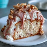 Luxurious Bridal Shower Rosé Velvet Cake, frosted and dripping with edible gold.